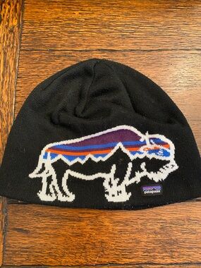 Patagonia Kids Black Beanie with Purple, Blue & Orange Buffalo Graphic